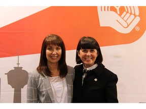 Karen Young (left) will take on the role of CEO and president of the United Way of Calgary and Area at the beginning of 2017, replacing Lucy Miller (right), who announced her retirement at the United Way annual general meeting and launch of The Social Equation campaign on Tuesday, April 26, 2016, at the University of Calgary downtown campus.