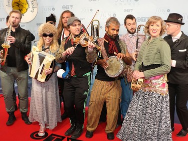 Members of the Lemon Bucket Orkestra on the red carpet at the 2016 Juno Awards at the Saddledome in Calgary, Alta., on Sunday, April 3, 2016.  (GAVIN YOUNG/POSTMEDIA)