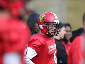 Kelton Bailey runs drills during the University of Calgary Dinos spring camp at McMahon Stadium in Calgary on Friday (Leah Hennel)