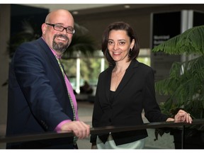 Micheline Maylor, who was named Calgary Poet Laureate, with outgoing laureate Derek Beaulieu following the announcement at City Hall Monday, April 25, 2016. She will serve as an artistic ambassador for Calgary from 2016 – 2018.