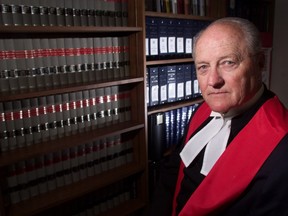 Former chief justice Ken Moore is pictured at his office at Court of Queen's Bench in 2000.