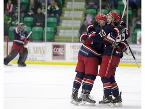 CALGARY.;  March 16, 2015  -- Brooks Bandits celebrate a goal against the Okotoks Oilers during playoffs at Pason Centennial Arena in Okotoks on March 16, 2015.  Photo Leah Hennel, Calgary Herald  (For Sports story by ?)