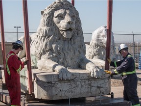 One of the original Centre Street Bridge lions is being repaired before being put on display in Rotary Park.