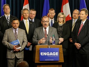 Ric McIver (middle/at podium), Interim Party Leader, and the Alberta Progressive Conservative Party Caucus, launched a new public engagement initiative at the Alberta Legislature on April 4, 2016.