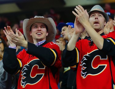 Fans give the Flames a standing ovation after their final home game of the season, a 7-3 win over the Vancouver Canucks in NHL hockey in Calgary, Alta., on Thursday, April 7, 2016. AL CHAREST/POSTMEDIA