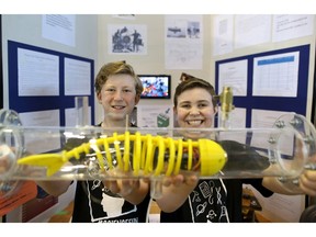 Tim Gubcki, Grade 7, left, and Griffin White, Grade 6, students from Westmount Charter School, with their Indestructible Submarine at the Calgary Youth Science Fair.