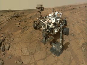 This image released by NASA on February 7, 2013, taken by Mars Hand Lens Imager (MAHLI) onboard NASA's Mars rover Curiosity, shows a self-portrait of NASA's Mars rover Curiosity that combines dozens of exposures taken by the rover's Mars Hand Lens Imager (MAHLI) during the 177th Martian day, or sol, of Curiosity's work on Mars.