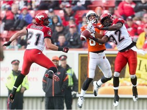 Aryn Toombs/Calgary Herald CALGARY, AB -- June 12, 2015 -- Calgary Stampeder defensive back Tevaughn Campbell jumps to intercept a B.C. Lions pass at McMahon Stadium in Calgary on Friday, June 12, 2015. The Calgary Stampeders tied the B.C. Lions, 6-6, at the end of the half in an pre-season exhibition game. (Aryn Toombs/Calgary Herald) (For Sports story by TBA) 00066123A SLUG: 0612 stampeders game