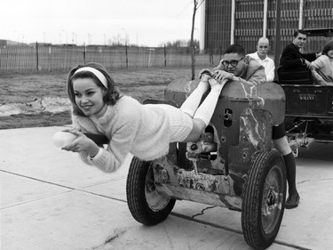 1964: Students arrive on campus during Bermuda Shorts Day with a Willys Jeep and a field gun from the Second World War, 1964.