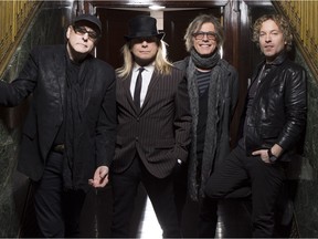 The current lineup of Cheap Trick features, from left, Rick Nielsen, Robin Zander, Tom Petersson and Daxx Nielsen.