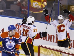 Calgary Flames forward Johnny Gaudreau celebrates the first of his two goals on the way to a 5-0 blanking of the Edmonton Oilers in the final NHL game at Rexall Place on Saturday. He reached the 30-goal milestone on the season. (Ian Kucerak)