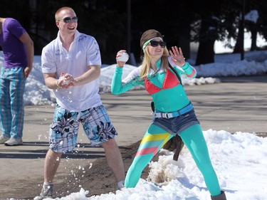 2011 - University of Calgary Bio Science student Alana Closs, right, and Business student Alan Farley, left, fired snowballs back at their opponents during an impromtu snowball fight during the annual Bermuda Shorts day.