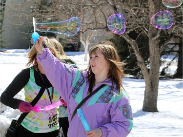 2011 - University of Calgary History student Lindsay Hall let some bubbles go while celebrating with friends the annual Bermuda Shorts day.