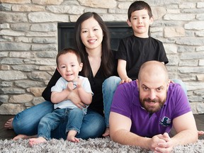 Lena Ziebart, with husband Darren Ziebart and children Ryan, 2, front row, and Devin, 6.