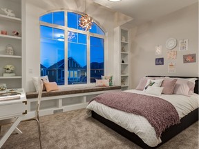 A secondary bedroom in the Westpoint show home by Homes By Us in West Grove Point.