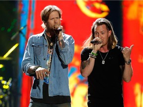 Singers Brian Kelley, left, and Tyler Hubbard of Florida Georgia Line will be heading to Calgary in November.