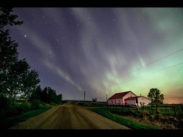 The aurora borealis lights up the night west of Calgary, Ab., on Sunday May 8, 2016. Mike Drew/Postmedia