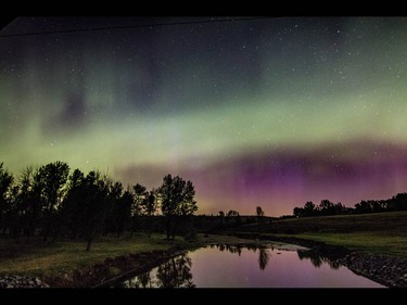 Aurora borealis lights up the night over Jumpingpound Creek west of Calgary, Ab., on Sunday May 8, 2016. Mike Drew/Postmedia