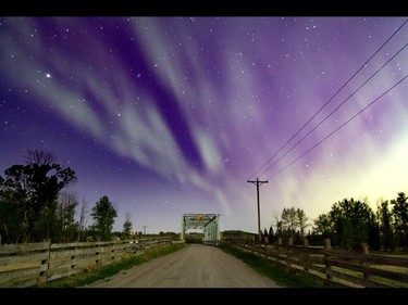 Aurora borealis lights up the night over Jumpingpound Creek west of Calgary, Ab., on Sunday May 8, 2016. Mike Drew/Postmedia