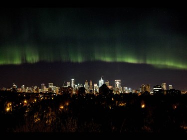 A streak of green aurora over downtown in Calgary, Ab., on Sunday May 8, 2016. Mike Drew/Postmedia