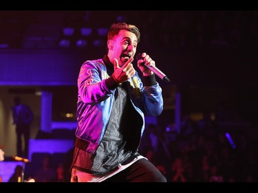 Jacob Hoggard, lead singer of Hedley and the band perform at the Scotiabank Saddledome in Calgary, Ab., on Friday May 13, 2016. Mike Drew/Postmedia
