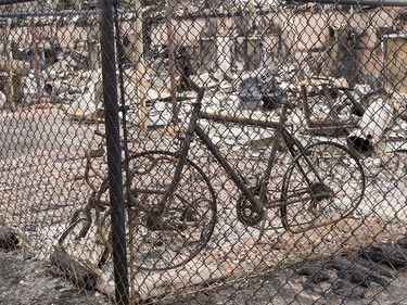 A bicycle is seen among the debris from the wildfire in the Abasands neighbourhood in Fort McMurray, Alta., on Monday, May 9, 2016.