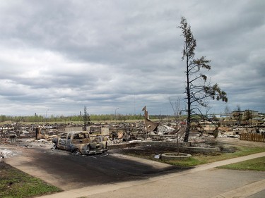 Damage from the wildfires is seen in the Beacon Hill neighbourhood in Fort McMurray, Alta., on Monday, May 9, 2016.