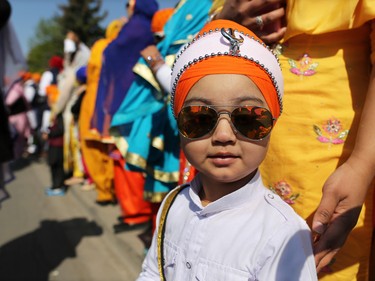 Dash Kaur, 3 was among thousands of Calgarians taking part in the Nagar Kirtan parade in Martindale on Saturday, May 14, 2016. The Nagar Kirtan is a Sikh tradition in which the procession sings hymns and hands out food as they walk through the community.