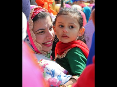 Thousands of Calgarians take part in the Nagar Kirtan parade in Martindale on Saturday, May 14, 2016. The Nagar Kirtan is a Sikh tradition in which the procession sings hymns and hands out food as they walk through the community.