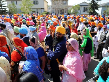 Thousands of Calgarians take part in the Nagar Kirtan parade in Martindale on Saturday, May 14, 2016. The Nagar Kirtan is a Sikh tradition in which the procession sings hymns and hands out food as they walk through the community.