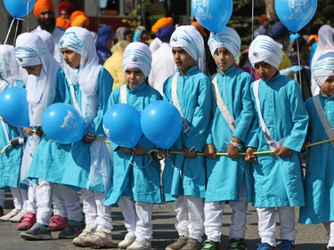 Thousands of Calgarians take part in the Nagar Kirtan parade in Martindale on Saturday, May 14, 2016. The Nagar Kirtan is a Sikh tradition in which the procession sings hymns and hands out food as they walk through the community.