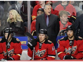 Calgary Flames head coach Bob Hartley yells at the bench during first period action in NHL hockey action at the Scotiabank Saddledome in Calgary, Alta. on Tuesday February 9, 2016. Leah Hennel/Postmedia