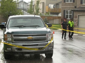 Calgary Police investigate at the scene of a serious pedestrian accident in the NW Calgary, Alta community of Tuscany on Thursday, May 26, 2016.