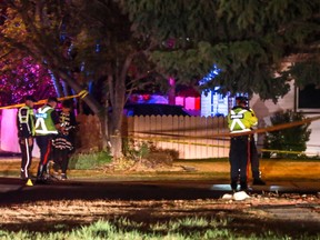 Calgary Police traffic investigators at the scene of a fatal collision where a child died at 79 st and 47 ave NW in Calgary, Ab., on Friday May 6, 2016.