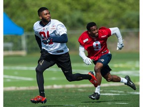 BRADENTON, FL - APRIL 17:  WR Darius Daniels, 81, and DB Travis Manning, 9, of the Calgary Stampeders practice during mini camp at IMG Academy in Bradenton, Fla., on April 17, 2015 in Bradenton, Florida.