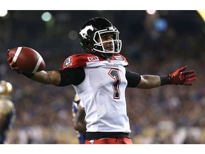 Calgary Stampeders receiver Lemar Durant celebrates his  touchdown catch against the Winnipeg Blue Bombers during CFL action at Investors Group Field in Winnipeg on Fri., Sept. 25, 2015. Kevin King/Winnipeg Sun/Postmedia Network