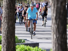 Calgary needs more walking and cycling, says columnist who laments city hall succumbed to Twitter and political pressure to pull postings for walking and cycling co-ordinators.