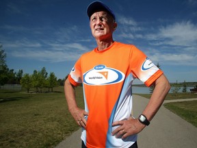 Dr Peter Nieman trains Wednesday May 25, 2016 on one of his favourite pathways, the 16 kilometre Glenmore Reservoir loop. He will be competing in his 100th matathon this weekend at the Scotiabank Marathon.