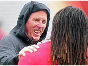 Calgary Stampeders GM John Hufnagel chats along the sidelines during the team's rookie camp Friday May 27, 2016. The main camp opens Sunday.