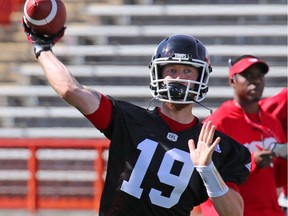 Quarterback Bo Levi Mitchell throws a pass during the opening day of the Calgary Stampeders training camp at McMahon Stadium on Sunday May 29, 2016. Gavin Young/Postmedia