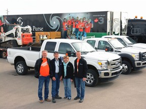 A convoy sent by Samaritan's Purse Canada and the Billy Graham Evangelistic Association of Canada is on its way to Fort McMurray to provide physical and spiritual aid to Fort McMurray residents. Convoy drivers are Harry Helm (left), John and Bev Vanmarrum, and Greg Schmidt.