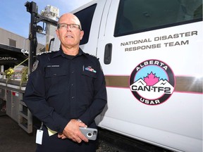 Tom Sampson, Chief of the Calgary Emergency Management Agency oversees as members of Taskforce 2 Disaster Response Team load equipment and supplies as they ready to deply to Fort McMurray from Calgary, Alta on Wednesday, May 4, 2016.