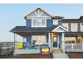 The front exterior of the freehold townhome development by Homes by Avi in Sunset Ridge in Cochrane.