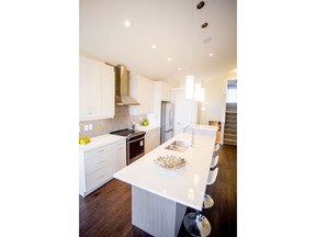 The kitchen in the Dogwood show home by ReidBuilt Homes in Fireside.