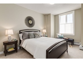A look at one of the bedrooms in The Gates at Quarry Park by Remington Development Corp.
