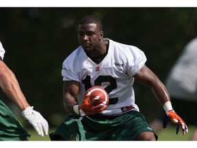 Eskimos' wide receiver Jacoby Ford (12) runs the ball as he participates in drills during the mini-camp at Historic Dodgertown in Vero Beach on Sunday, April 17, 2016.