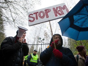 NOVEMBER 24, 2014 -- Protestors demonstrate near a Kinder Morgan survey site on Burnaby Mountain in Burnaby.