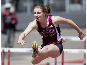 Gabrielle Gregg of Rundle College flies through the girls intermediate 80-metre hurdles during the city's high school track and field finals at Foothills Athletic Park in Calgary, Alta., on Saturday, May 28, 2016.