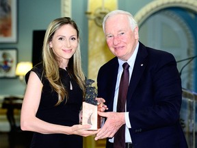 David Johnston presents the Governor General's Innovation Awards to J. Breanne Everett from Calgary.