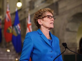 Ontario Premier Kathleen Wynne speaks at a media availability to discuss an energy innovation partnership between Alberta and Ontario at the Alberta Legislature Building in Edmonton on Thursday, May 26, 2016.